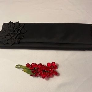 Inge Christopher black clutch